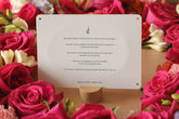 Affirmation card bamboo stand surrounded by flowers